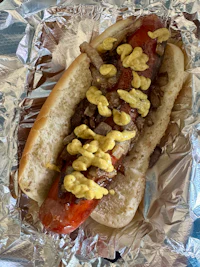 a hot dog wrapped in foil